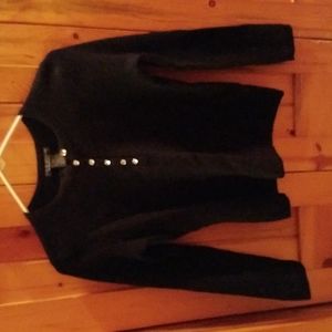 100% Italian Merino Wool, black sweater, buttons are a bit of bling!